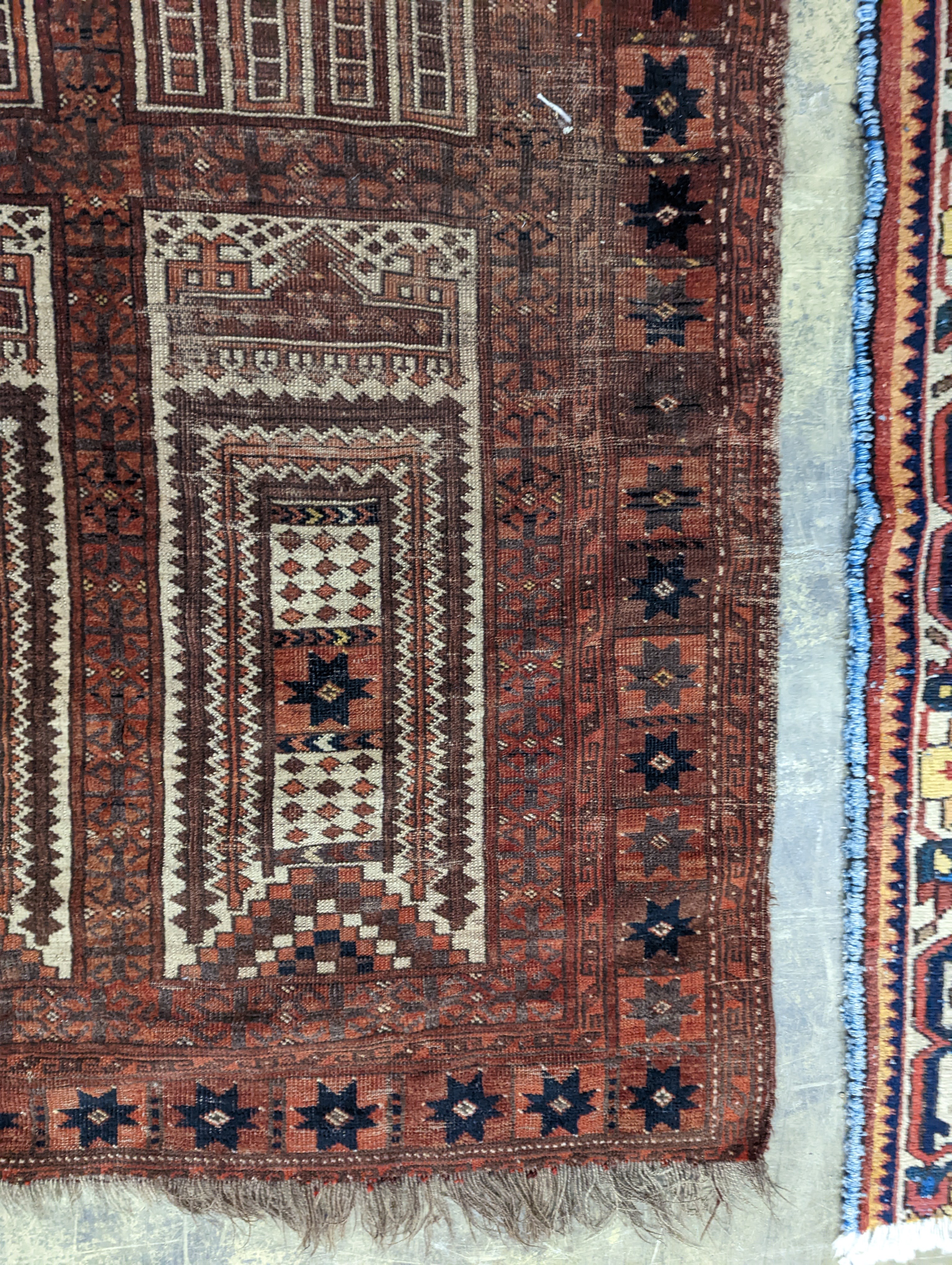 An Afghan red ground prayer rug, 166 x 120cm